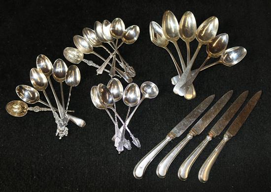 11 various teaspoons and other minor flatware.